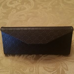Gucci eyeglass case.